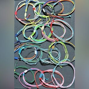 31.  Lot Of 19 Nylon Cord Adjustable Friendship Bracelets